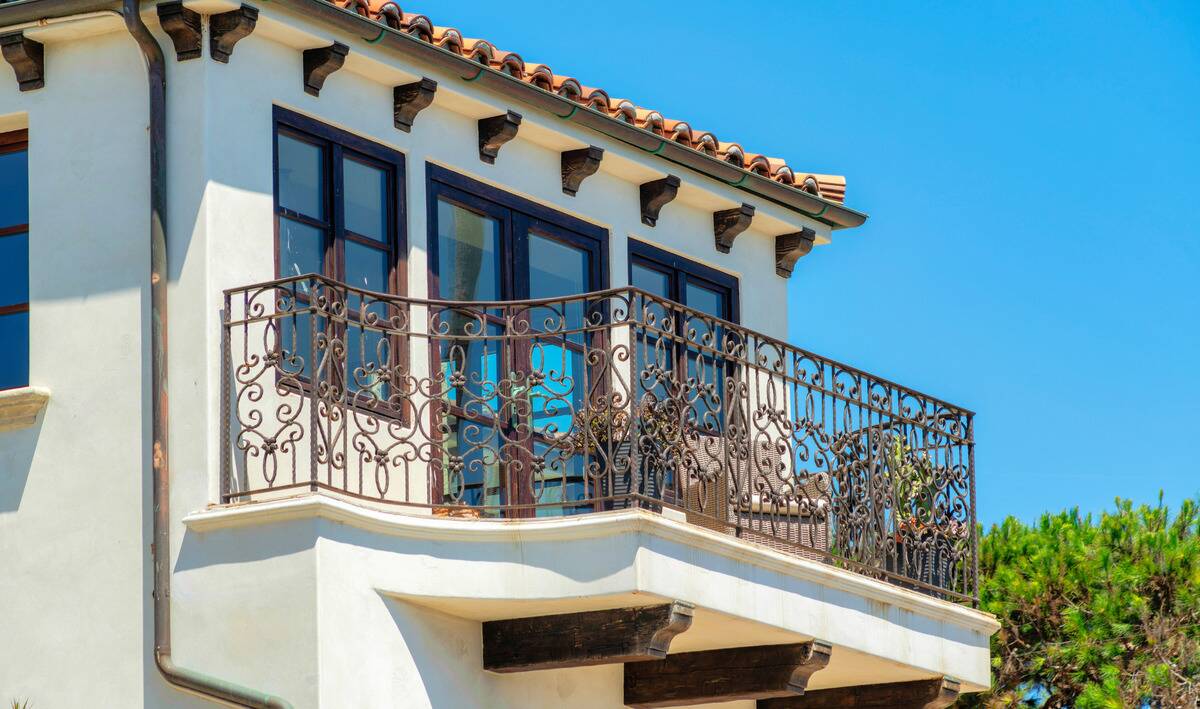 A Mediterranean home's second-story balcony.